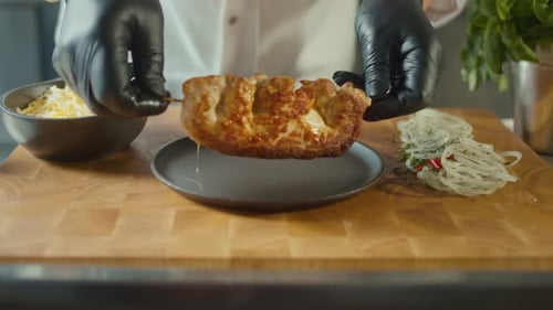 Chef Prepares Meat Skewer in Commercial Kitchen