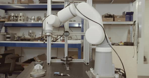 Robotic arm doing repetitive task, People Stock Footage ft. robotics ...