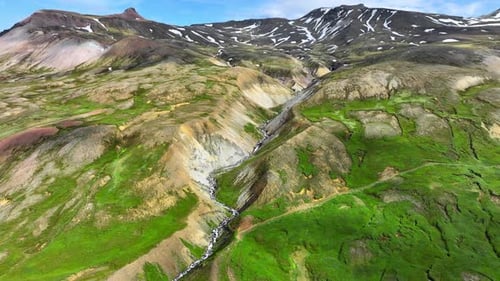 Colorful Mountain Range in Iceland Summer Inspiring Landscape with Snow Grass and River Unusual