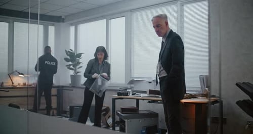 Robbery or Murder in Office Female Forensic Scientist Packs Gun in Zip Lock Bag Talks to Male