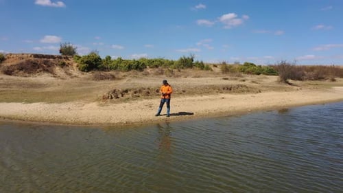 Photographer By The Lake