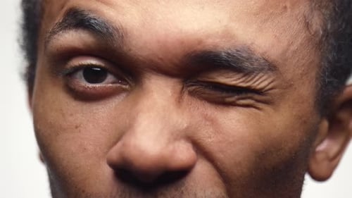 Closeup of a Man Winking