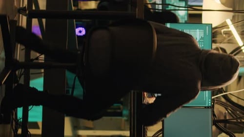 Vertical Video Woman Hacker Planning Phishing and Espionage at Night