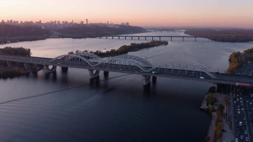 Evening Urban Kiev Cityscape with Bridges Over the River