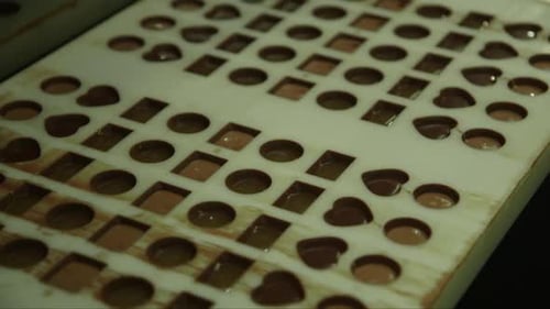 Chocolate Candy Production in Sweet Factory Mold