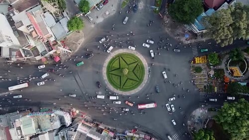 zooming in shot of a busy roundabout during rush hour in Ho Chi Minh city, Saigon, Vietnam