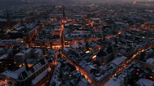 Aerial shot of Bonn city at night in winter. Snow covered city at night. city lights at night, Germa