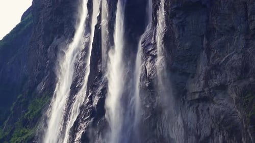 A breathtaking view of the Seven Sisters waterfalls in the Geiranger fjord, Norway. A powerful curre