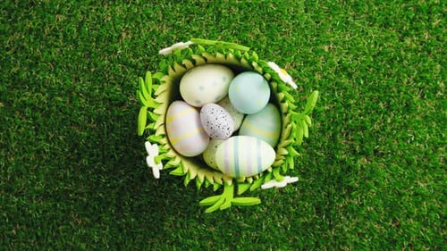 Rotating Painted Easter Eggs on Green