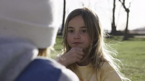 Caucasian Brothers Playing Hand Clapping Game Outdoors Young Children Having Fun Enjoying Free Time