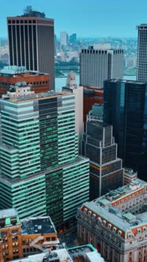 Evening view of the gorgeous architecture of New York. Drone footage slowly approaching skyscrapers.