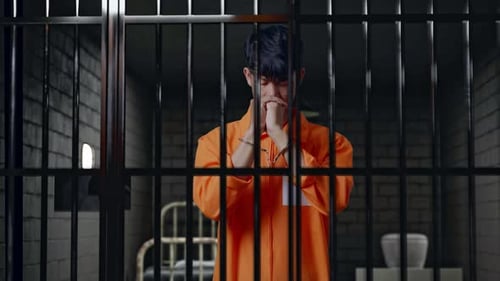 Prisoner In Handcuffs Prays For Something In Prison
