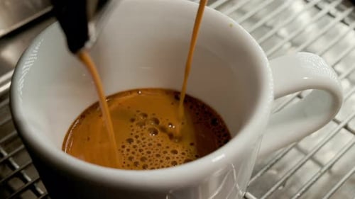 Espresso Pouring into a Cup, Close Up