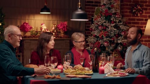 Family Celebrates Christmas Dinner Together