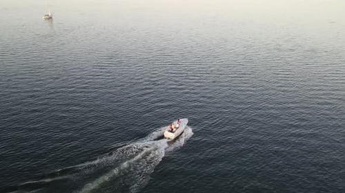 Tourists Ride On Motorboat Cruising At Lake Pontchartrain In Louisiana, USA. - aerial