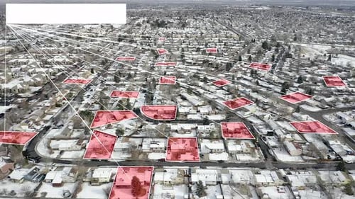 Motion graphics with blank text box outlines homes in red from above.