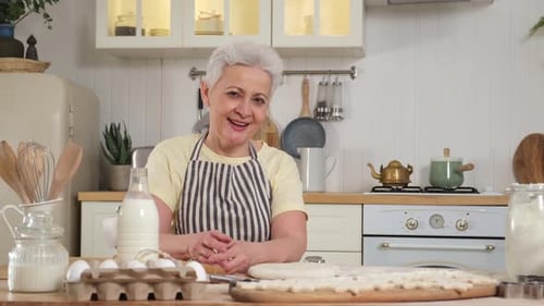 Woman Baking in a Bright Kitchen