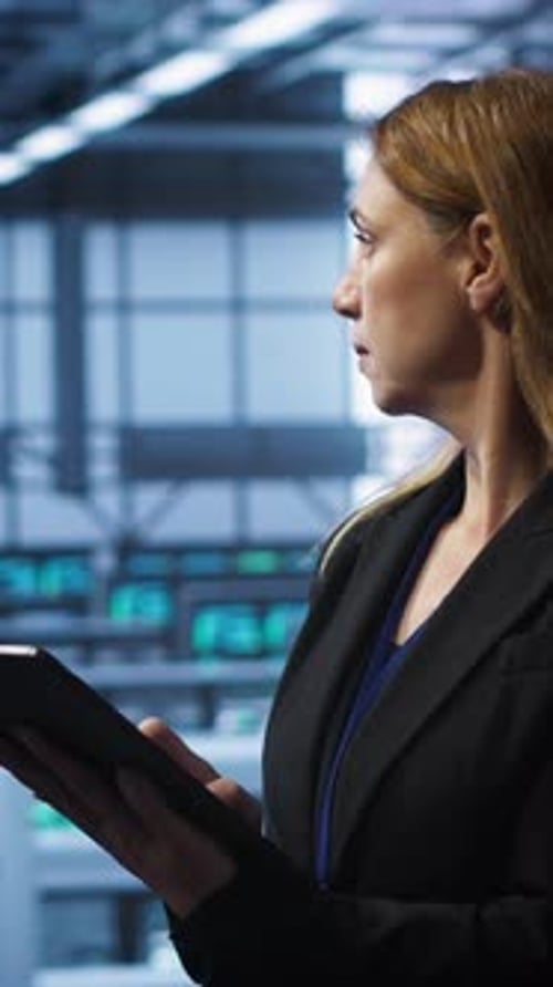 Vertical Video IT Expert in Server Hub Workplace Monitoring Supercomputers