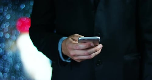 hand typing on a cell phone in a moment of relaxation in slow motion