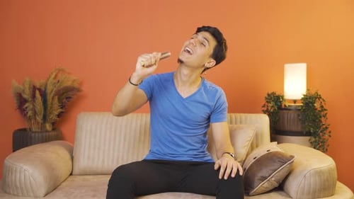 The man is singing.