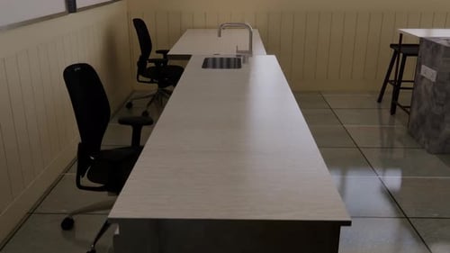 Long office desk with black chairs