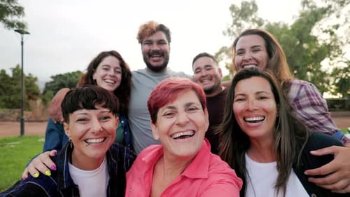 Group of Friends Smiling Together in Urban Park