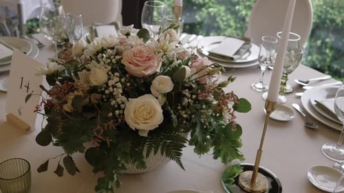 Wedding Reception Table with Elegant Floral Arrangement