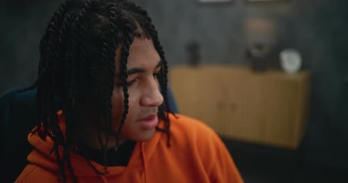 Young Adult Speaking Indoors