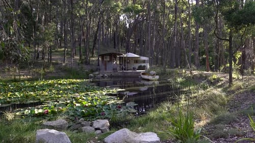 Beautiful isolated cabin on a lake in the forest, relaxing getaway (4K)