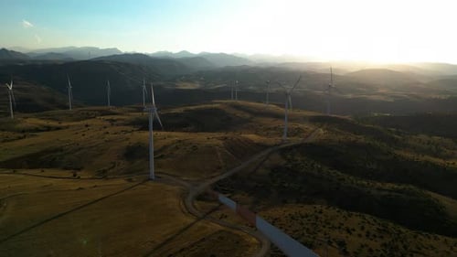 Wind Turbines Turning in a Rural Mountain Landscape