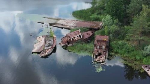View of the Sunken Rusted and Abandoned Barges