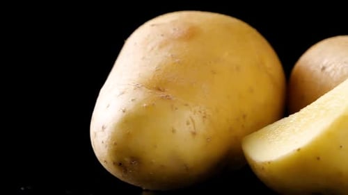 Super Slow Motion Shot of Fresh Potatoes