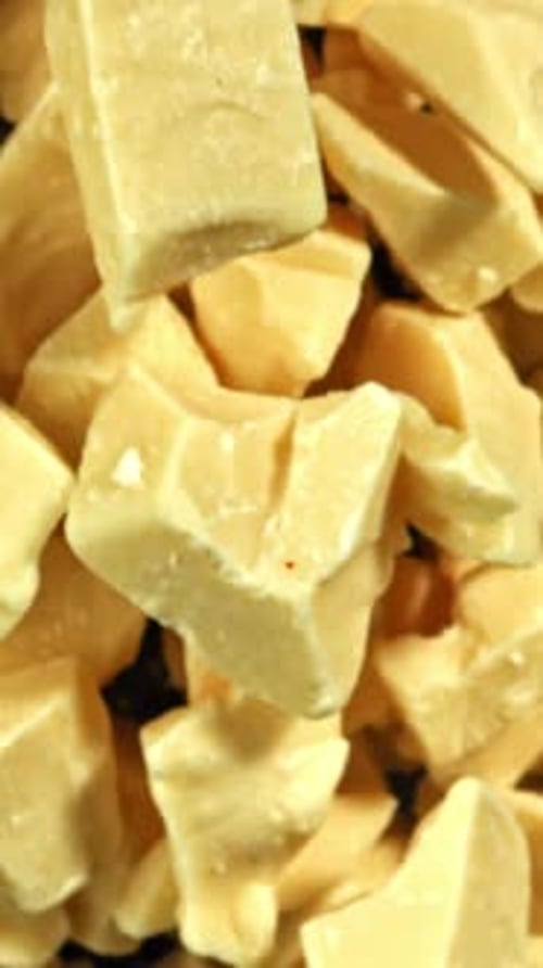 Super Slow Motion Pieces of White Chocolate Filmed on a Highspeed Camera at 1000 Fps