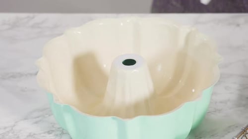 Time Lapse Step By Step Empty Baking Pan Prepared to Bake a Lemon Pound Cake