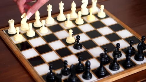 Yuriy Chess pieces. Chess board from hard strategy logic game.