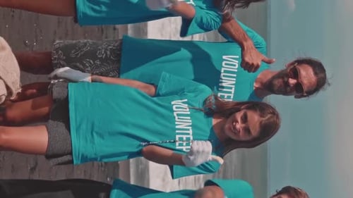 Caucasian Eco Activists Showing Thumbs Up After Cleaning Beach From Garbage