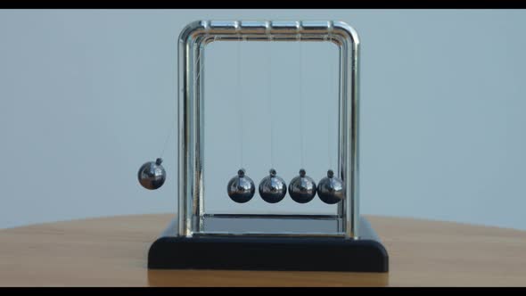 Closeup of Newton Balls with Swinging Metal Spheres on the Windowsill ...
