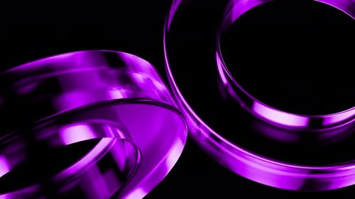 Purple metallic rings rotating on black background