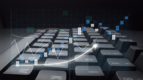 Tastatur mit Finanzdiagrammen zur Anzeige von Wachstumstrends und Marktanalysen für Unternehmen und Wirtschaft