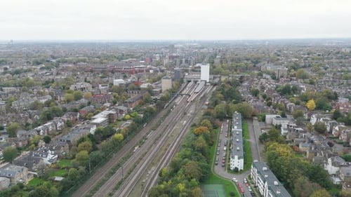 High Speed Passenger Train Racing Through the Platform at Full Momentum
