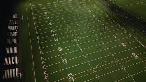 Women Football Practice At Night In Dartmouth Nova Scotia Aerial Soccer Footage