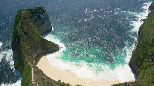 Aerial view of spectacular cliffs and a tropical beach