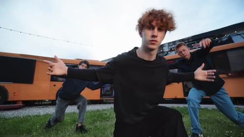 Hiphop Dance Performing of Team of Breakdancers in Bus Station Cool Guys Dancing Together Outdoors