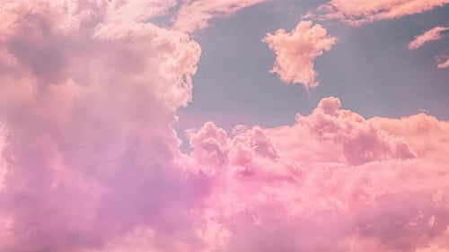 Pastel Pink Clouds Drifting Gently in a Beautiful Sky