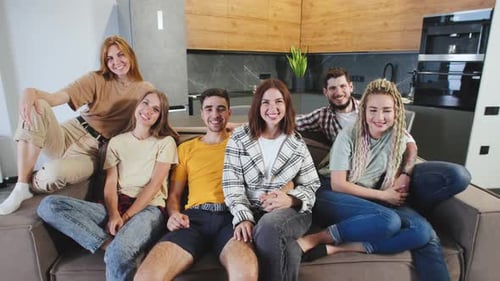 Group of Friends Relaxing on a Couch