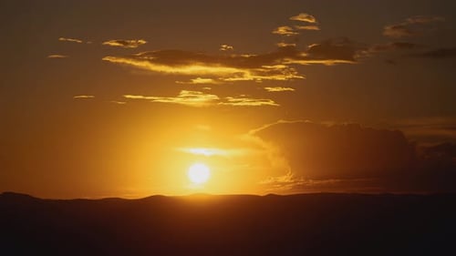 Golden Sunrise Illuminates Mountain Landscape