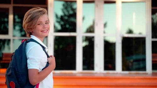 Portrait of Middle School Preteen Student Child Boy Girl with Backpack Looking at Camera Smiling in