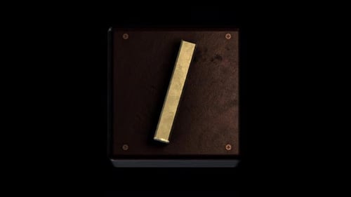 Abstract Rotating Golden Element on Dark Plate