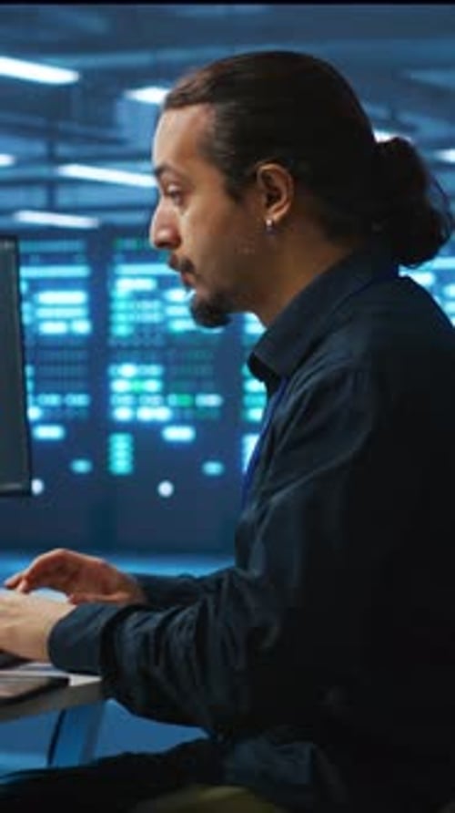 Man Typing on Keyboard in Technology Workplace