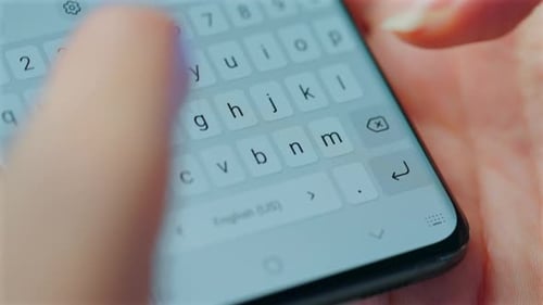 Fingers Typing on Phone Keypad, Close Up
